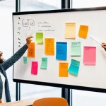 Home 17 창의적 사고 훈련을 위한 기법 - **Prompt:** A dynamic and vibrant brainstorming session in a modern, sunlit co-working space in Lisb...
